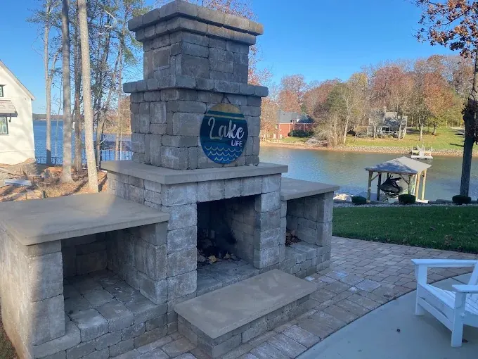Outdoor fireplace and patio, on the water